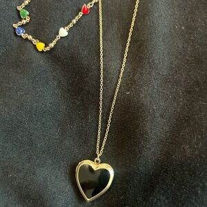 Beautiful golden chain with an open heart and choker/heart-shaped applications